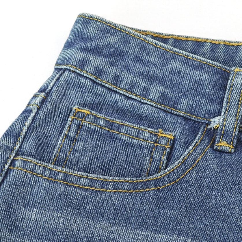 Close-up of Ciao Cult Women’s High-Waist Ripped Straight-Leg Jeans waistline and front left pocket detail.