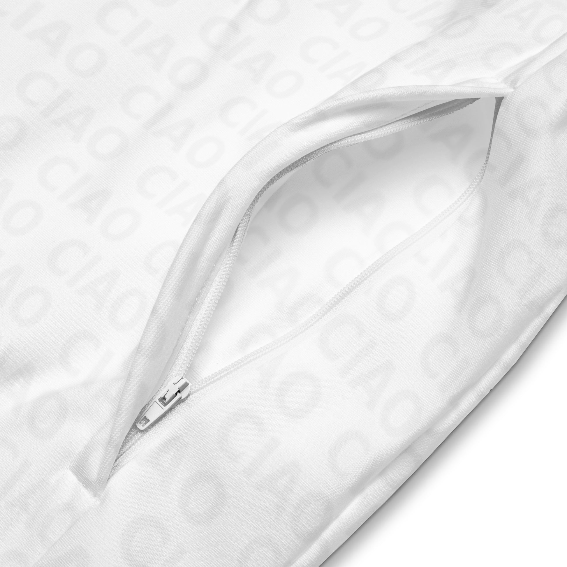 White zip-up track jacket sleeve with silver zipper and subtle embossed logo pattern background. - Ciao Cult - 2XS