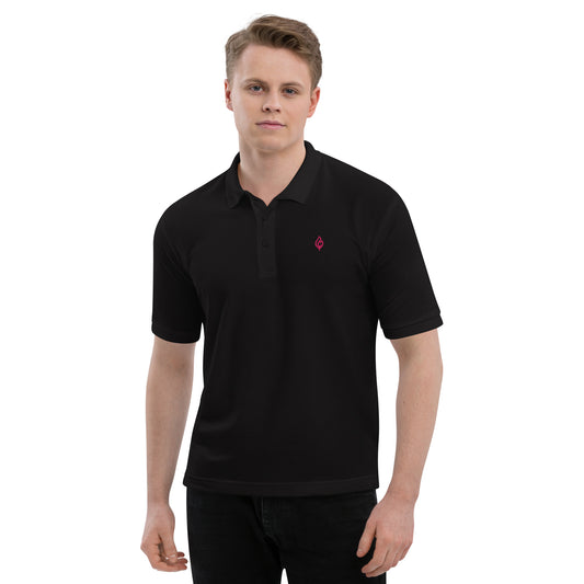 Male model front view wearing Ciao Cult Men’s Signature Flame Polo in black with flamingo-pink flame emblem.