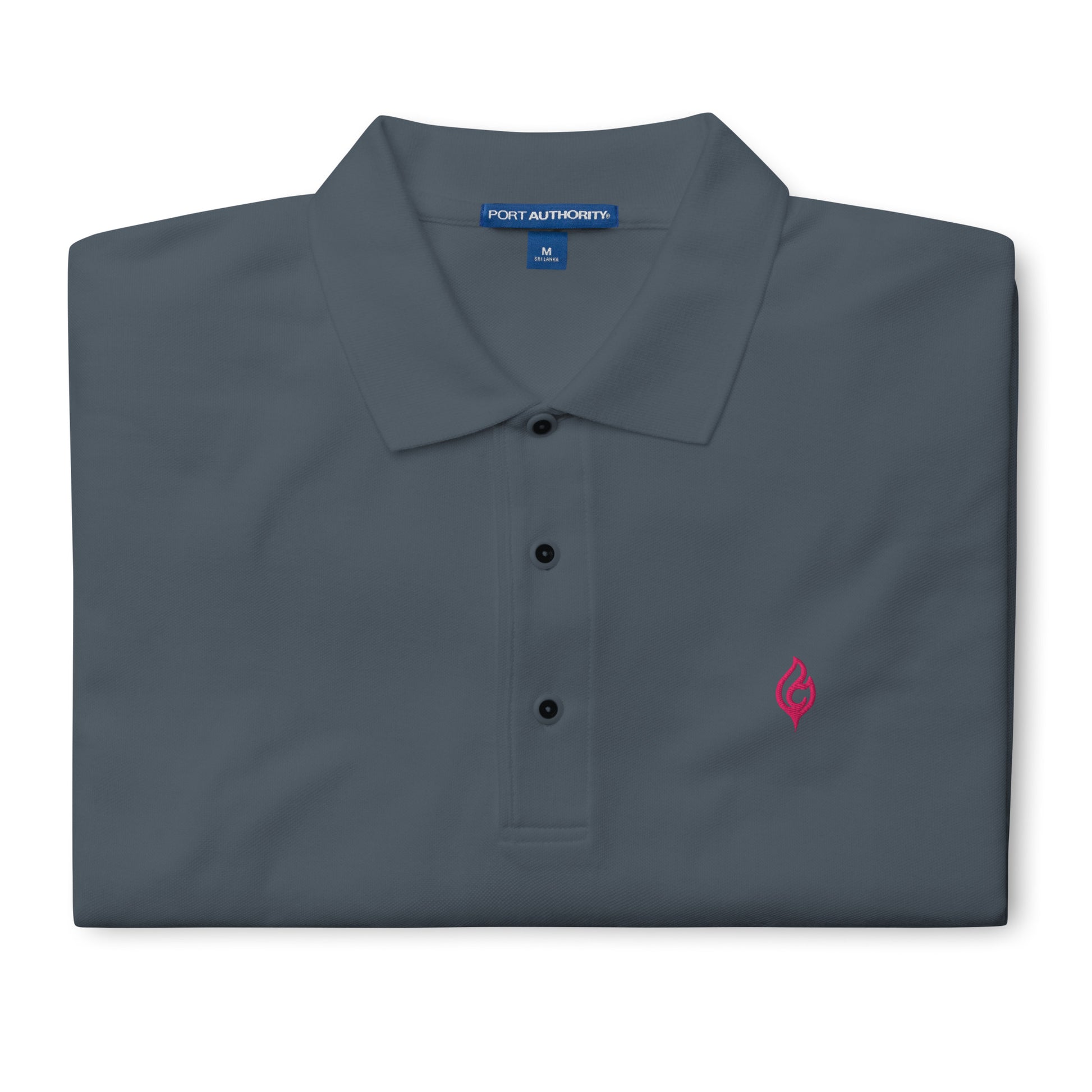 Folded Ciao Cult Men’s Signature Flame Polo in steel grey showing flamingo-pink embroidered flame emblem.