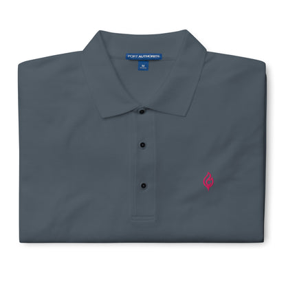 Folded Ciao Cult Men’s Signature Flame Polo in steel grey showing flamingo-pink embroidered flame emblem.