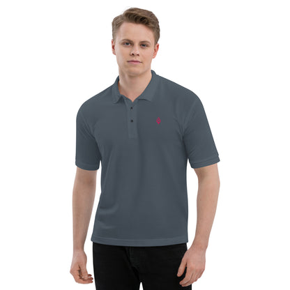 Male model front view wearing Ciao Cult Men’s Signature Flame Polo in steel grey with flamingo-pink flame emblem.
