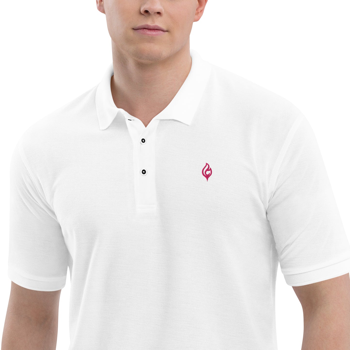 Close-up waist-to-jaw view of male model wearing Ciao Cult Men’s Signature Flame Polo in white with flamingo-pink flame emblem.