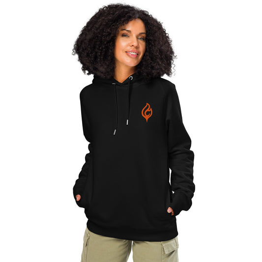 Female model front pose wearing Ciao Cult Orange Flame Organic Hoodie in black with flame logo, white background.