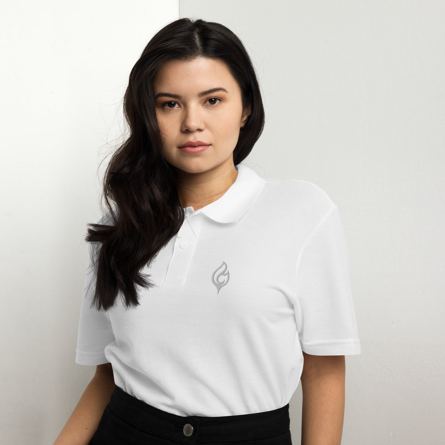 Female model waist-up front view wearing Ciao Cult Tonal White-on-White Signature Flame Polo, minimalist luxury streetwear look.