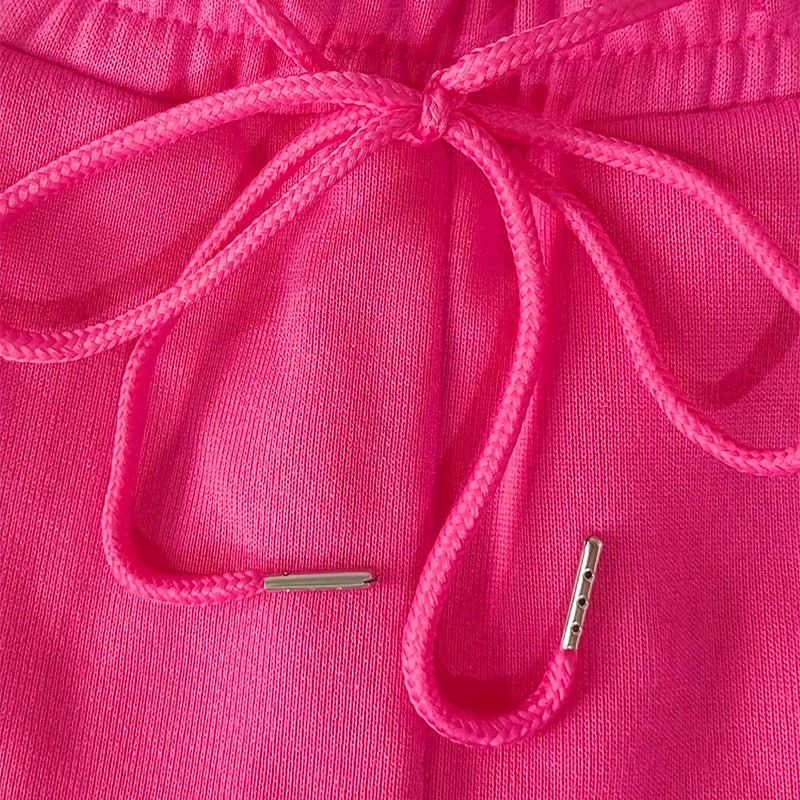 Close-up of Ciao Cult Women’s Straight-Leg Pants in rose red, highlighting adjustable waist drawstring detail.